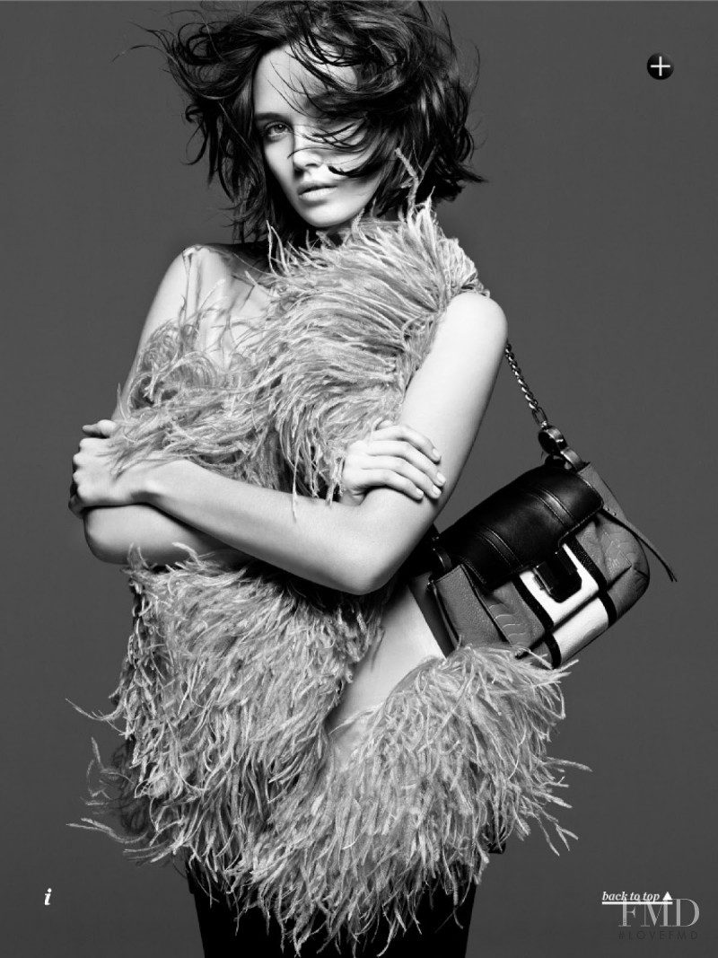 Caitlin Lomax featured in In Full Plume, September 2013