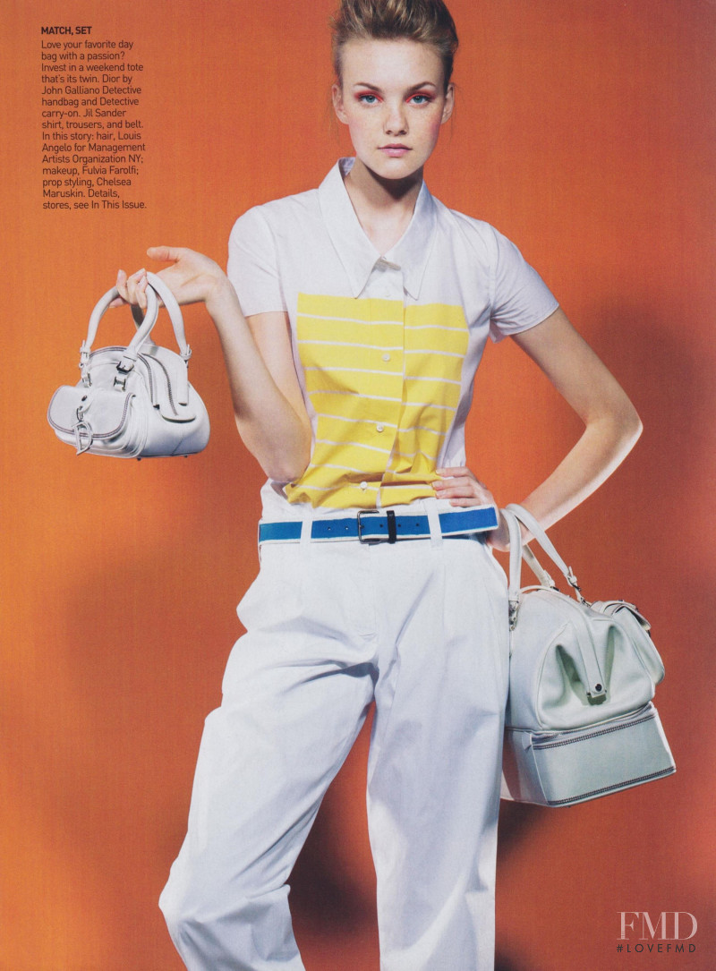 Caroline Trentini featured in Power Trend: Extra, Extra! - 1. Double Bag It, March 2005