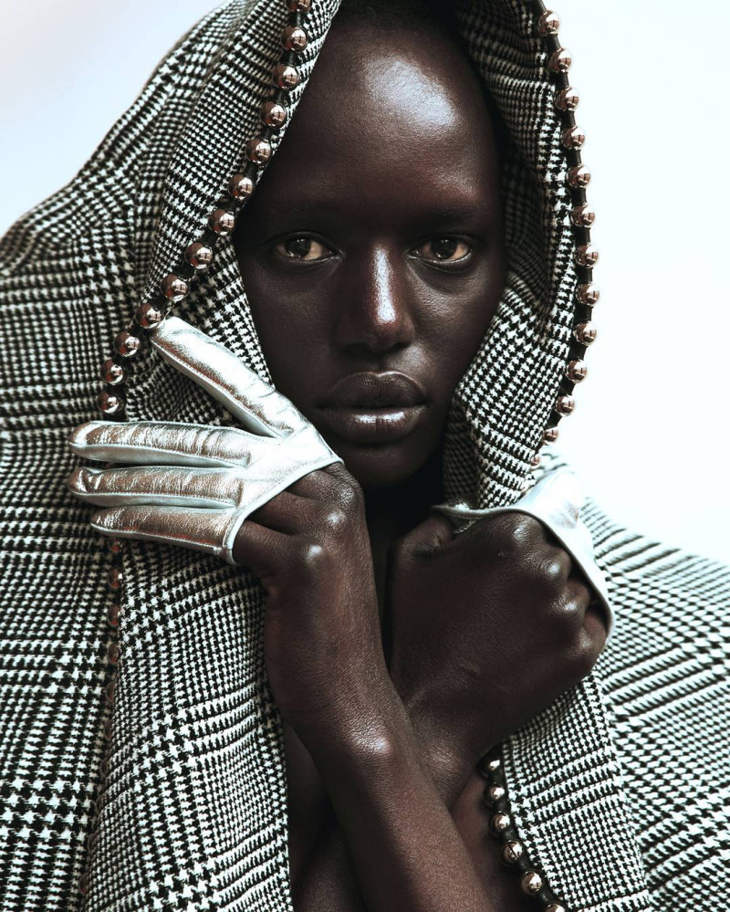 Ajak Deng featured in Celebrating 15 years, September 2017