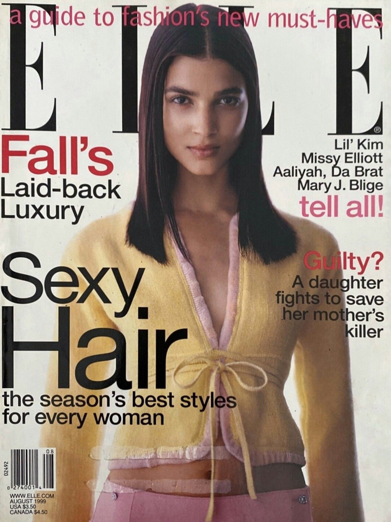 Teresa Lourenço featured on the Elle USA cover from August 1999