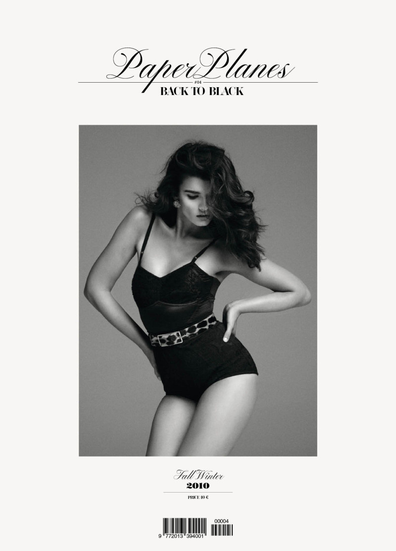 Crystal Renn featured on the Paper Planes Magazine cover from November 2010