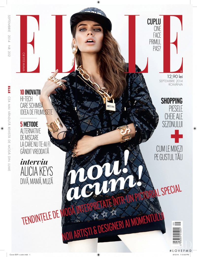 Iulia Carstea featured on the Elle Bulgaria cover from September 2014