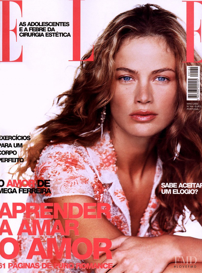 Carolyn Murphy featured on the Elle Portugal cover from May 2002