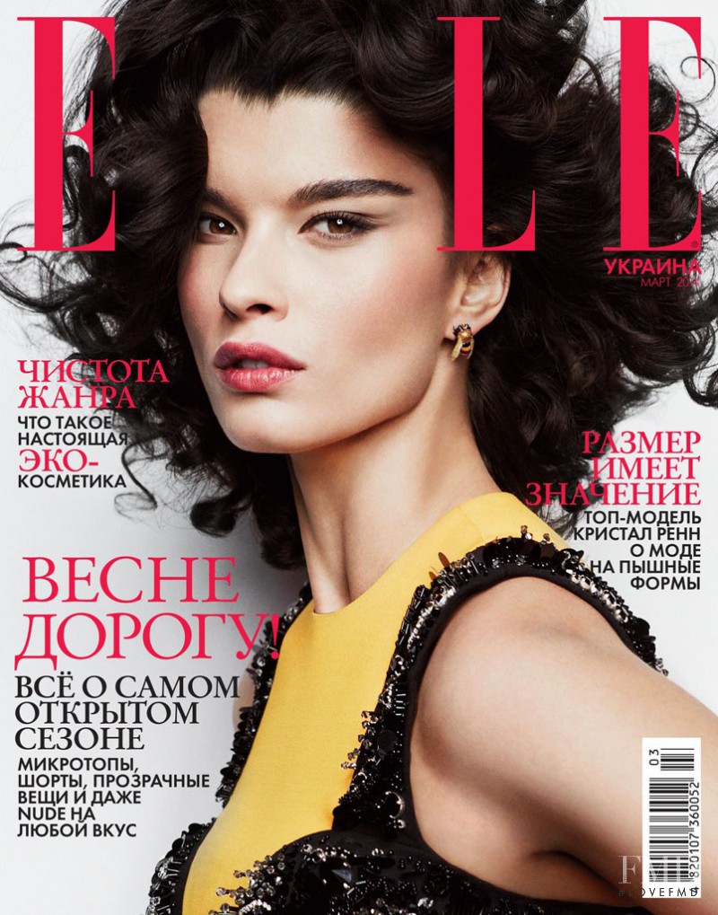 Crystal Renn featured on the Elle Ukraine cover from March 2014