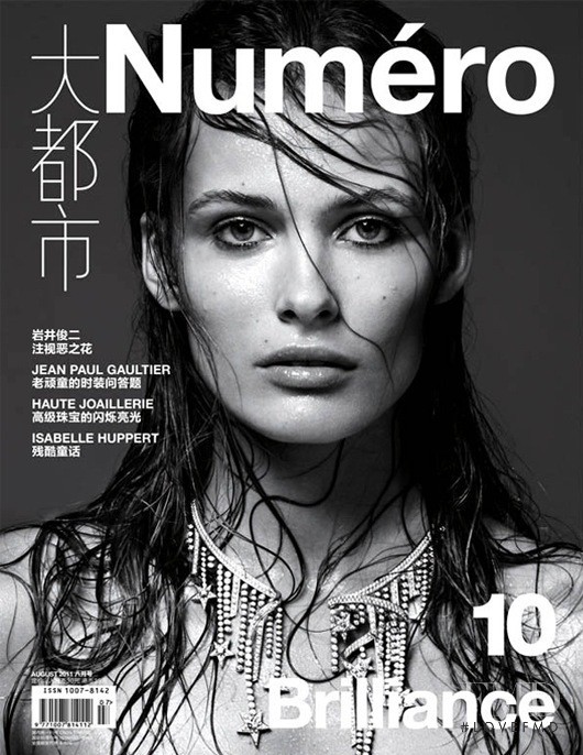 Edita Vilkeviciute featured on the Numéro China cover from August 2011
