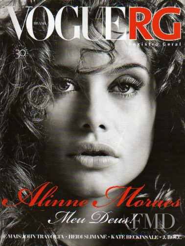 Alinne Moraes featured on the RG Vogue Brazil cover from August 2005