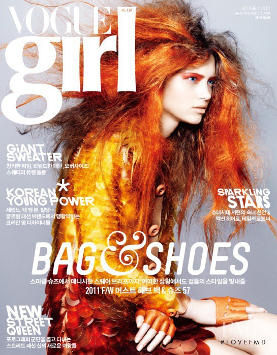 Mila Krasnoiarova featured on the Vogue Girl Korea cover from October 2011