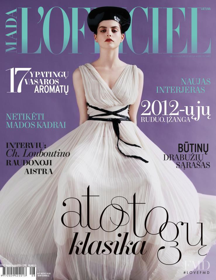 Kit Reeve featured on the L\'Officiel Lithuania cover from July 2012