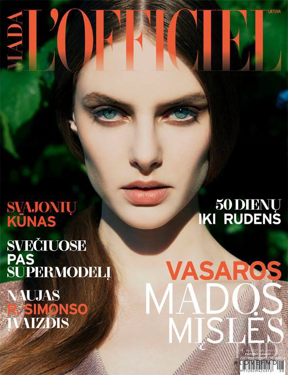 Auguste Abeliunaite featured on the L\'Officiel Lithuania cover from July 2013