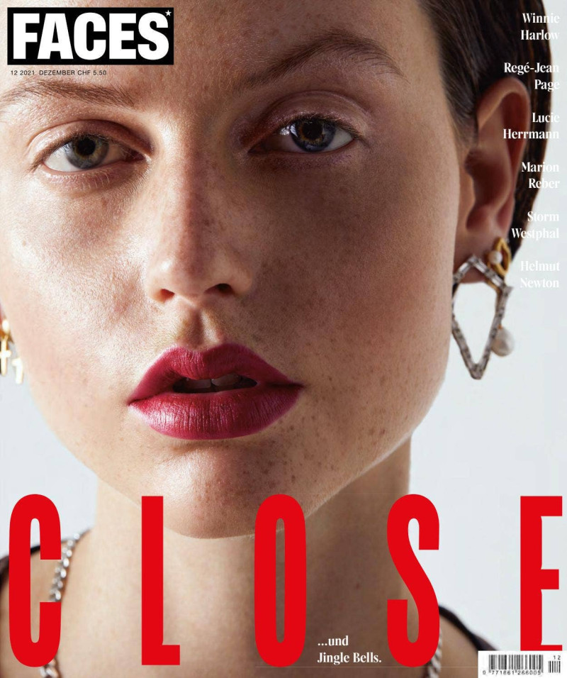 Lola Hamann featured on the FACES Magazine cover from December 2021