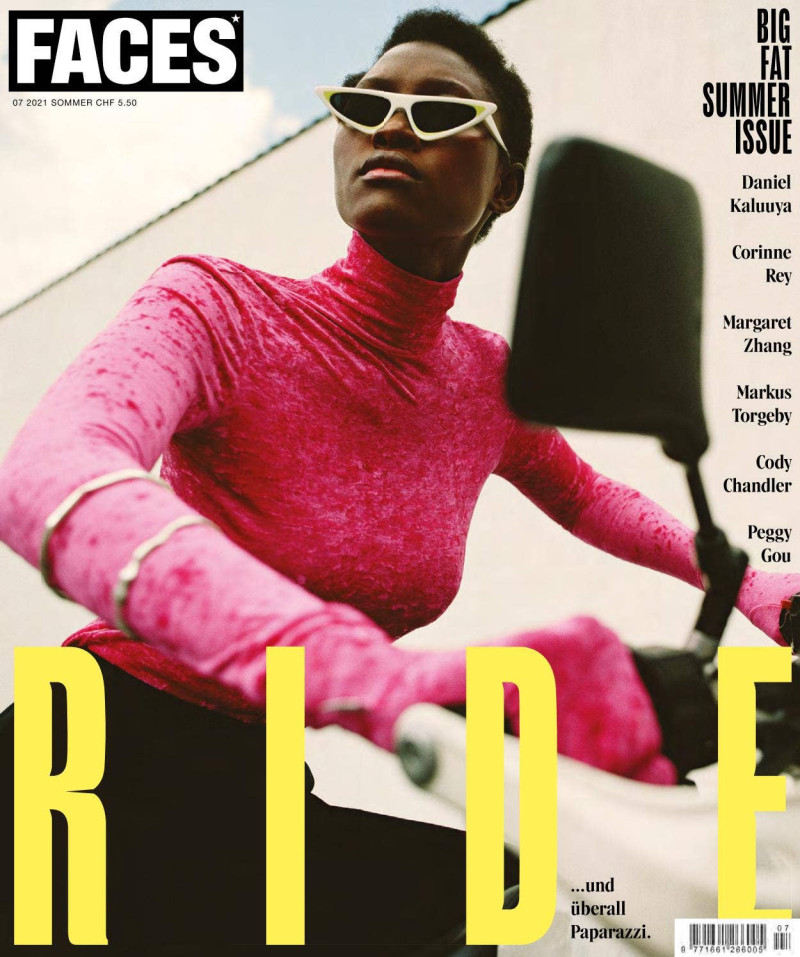 Aya Gueye featured on the FACES Magazine cover from July 2021