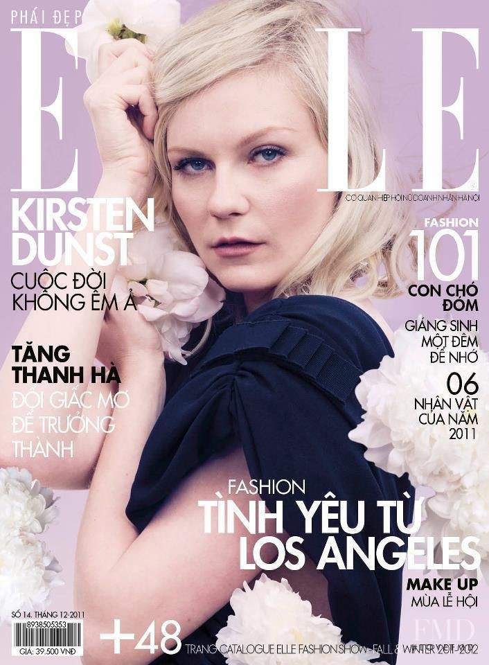 Kirsten Dunst featured on the Elle Vietnam cover from December 2011