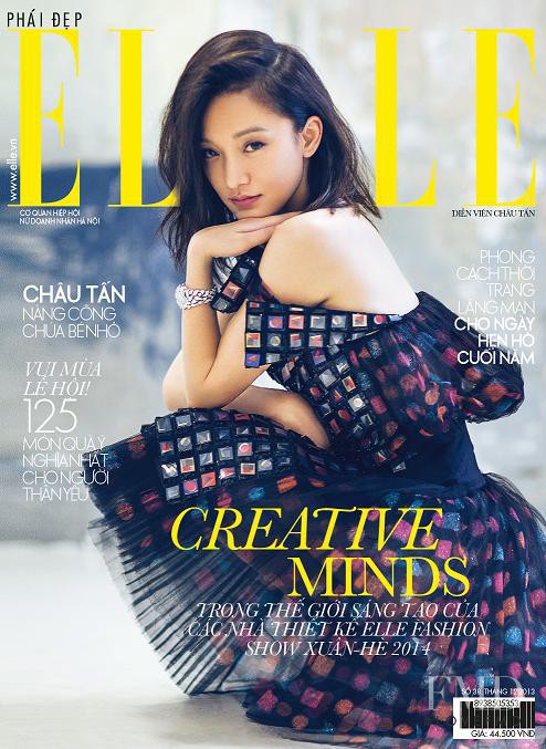 Xun Zhou featured on the Elle Vietnam cover from December 2013