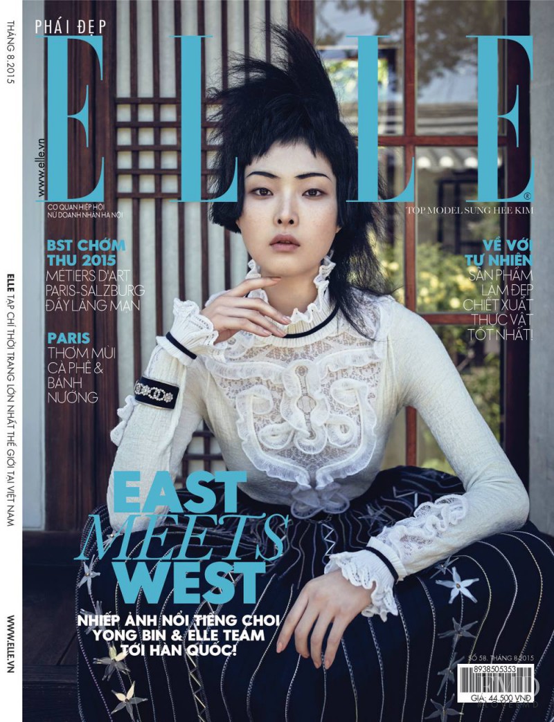Sung Hee Kim featured on the Elle Vietnam cover from August 2015