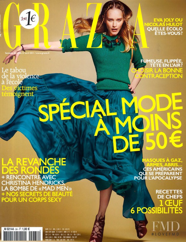 Iza Olak featured on the Grazia France cover from April 2011