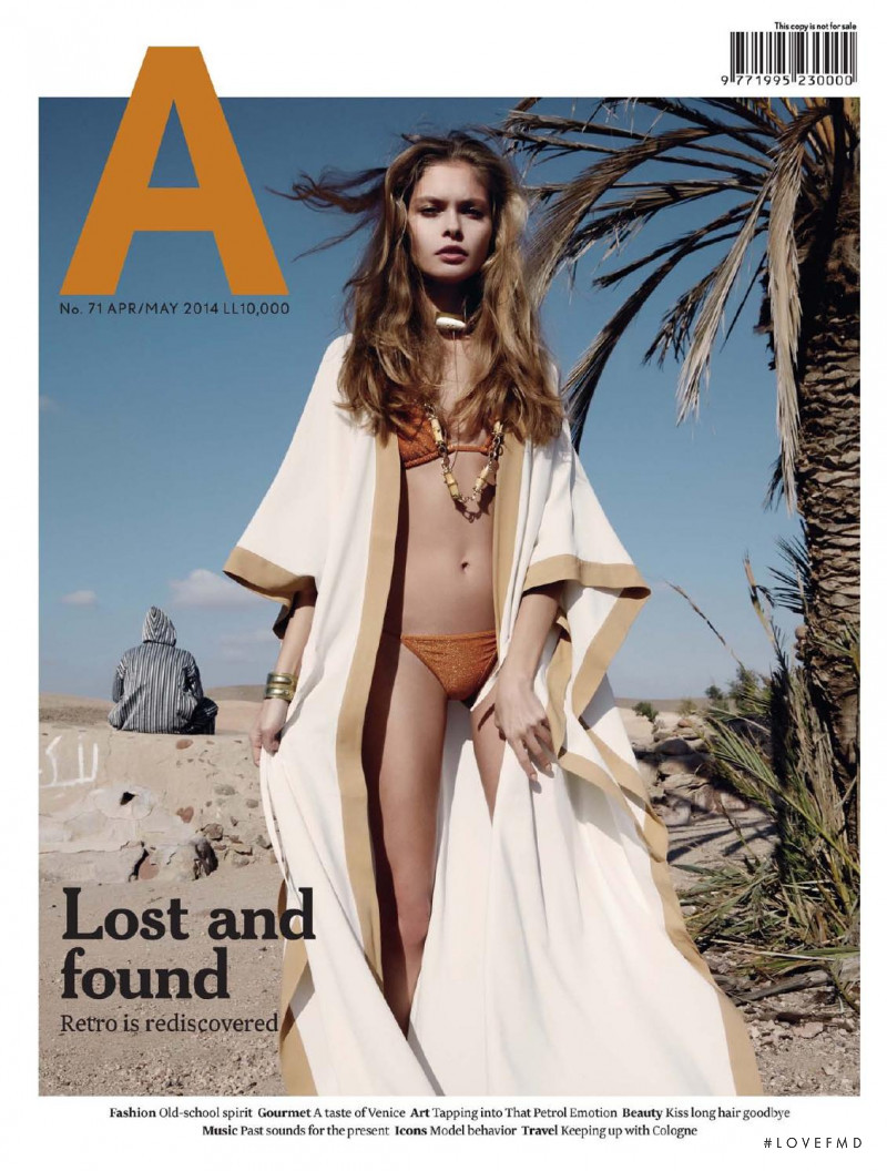 Anna Rudenko featured on the Aishti Magazine cover from April 2014