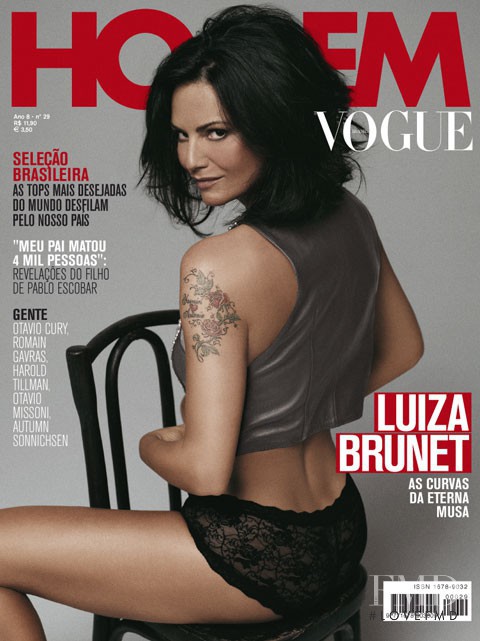 Luiza Brunet featured on the Vogue Homem Brazil cover from July 2010