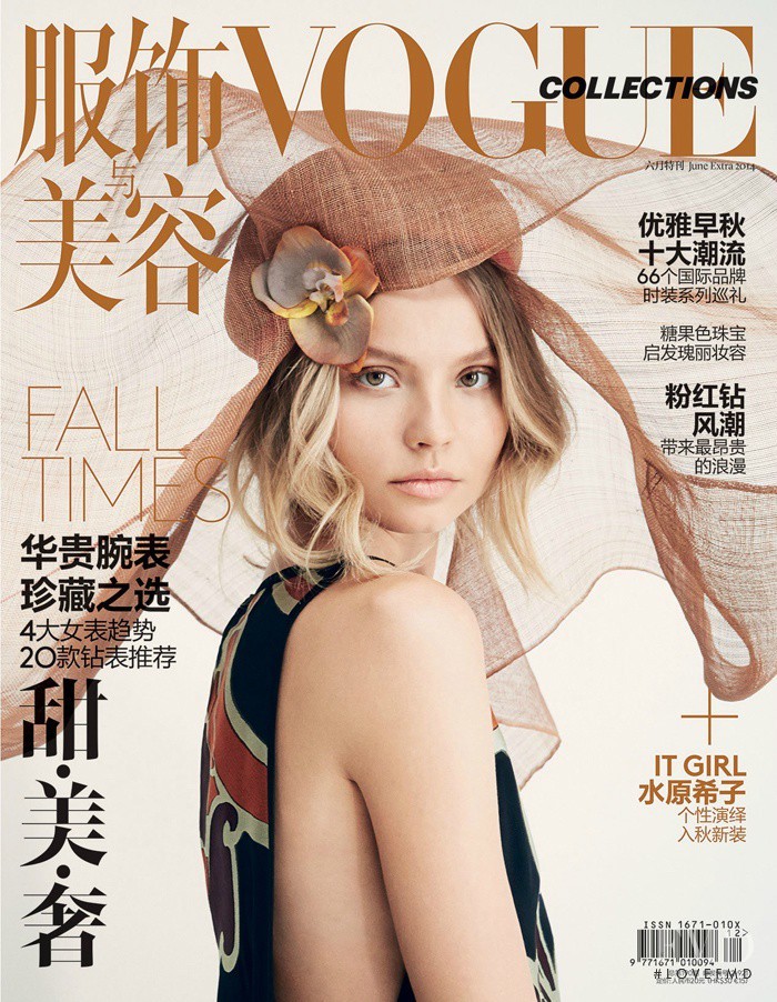 Magdalena Frackowiak featured on the Vogue Collections China cover from September 2014