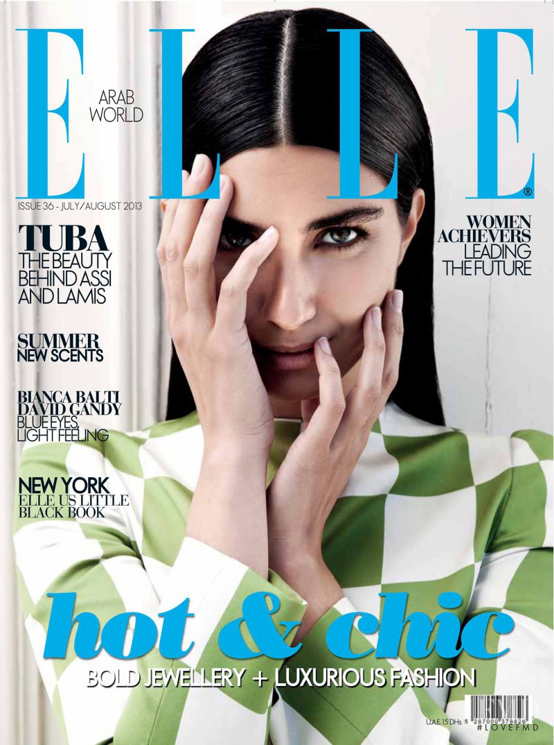 Tuba Buyukustan featured on the Elle Arabia cover from July 2013