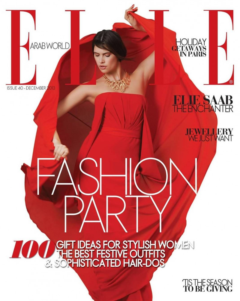Lucie Pustova featured on the Elle Arabia cover from December 2013