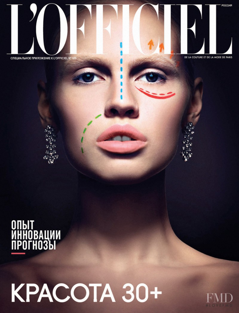 Masha Kirsanova featured on the L\'Officiel Russia cover from March 2011
