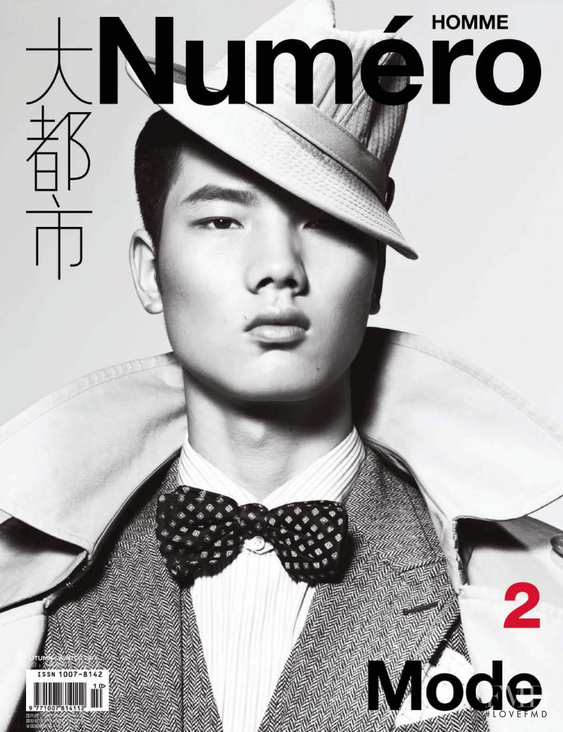 Hou Jinxiang featured on the Numéro Homme China cover from September 2011