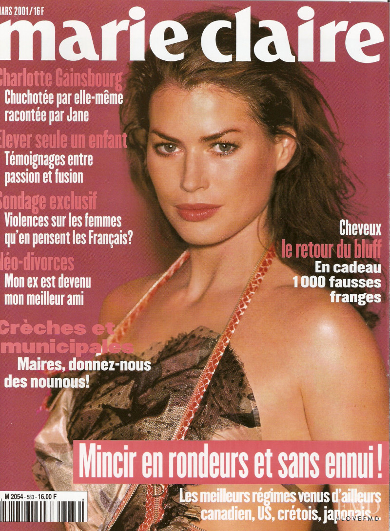 Carre Otis featured on the Marie Claire France cover from March 2001