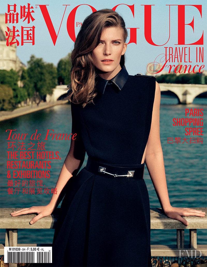 Valerija Kelava featured on the Vogue Travel in France cover from September 2014