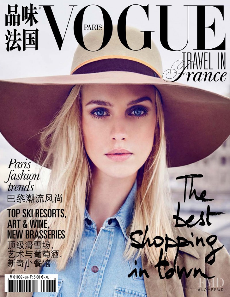 Julia Frauche featured on the Vogue Travel in France cover from March 2015