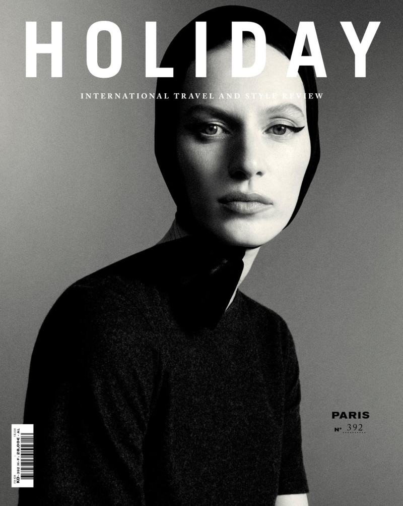 Julia Nobis featured on the Holiday cover from September 2023