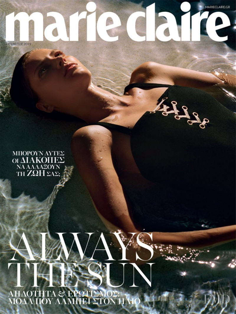 Natalia Bulycheva featured on the Marie Claire Greece cover from August 2019