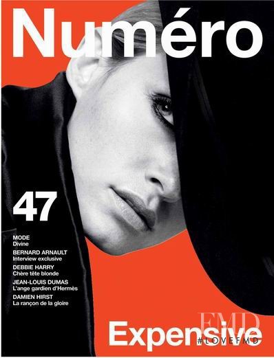 Amber Valletta featured on the Numéro France cover from October 2003