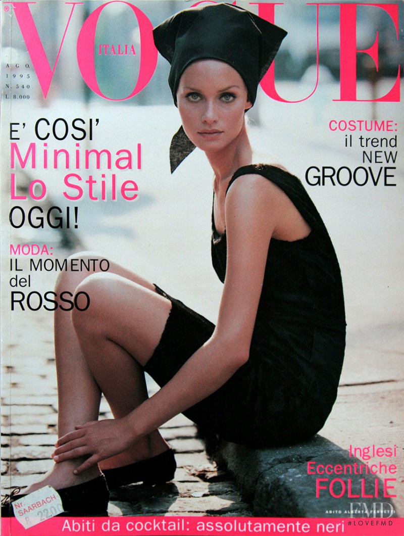 Amber Valletta featured on the Vogue Italy cover from August 1995