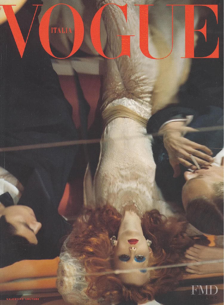 Karen Elson featured on the Vogue Italy cover from March 2000