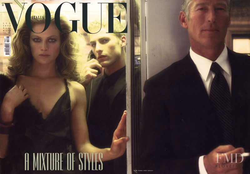 Carolyn Murphy featured on the Vogue Italy cover from July 2002