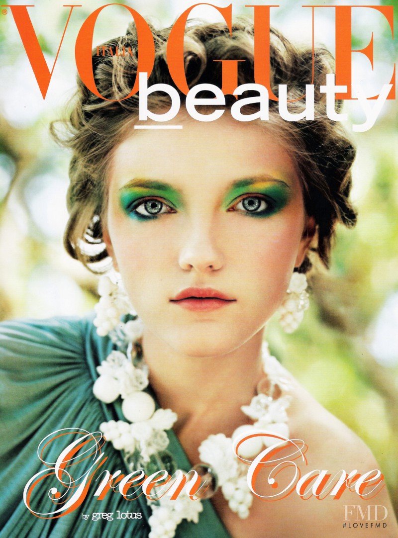 Vlada Roslyakova featured on the Vogue Italy cover from April 2005