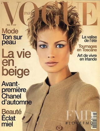 Carolyn Murphy featured on the Vogue France cover from May 1996