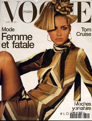 Ana Claudia Michels featured on the Vogue France cover from August 2000