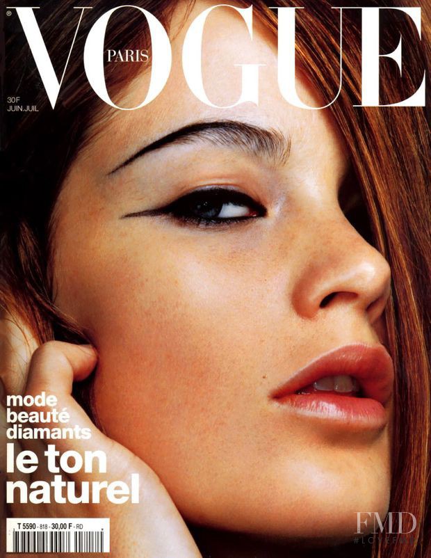 Carolyn Murphy featured on the Vogue France cover from July 2001