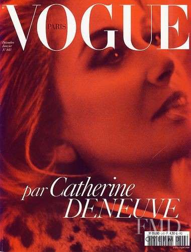 Catherine Deneuve featured on the Vogue France cover from December 2003
