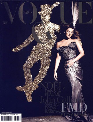 Drew Barrymore featured on the Vogue France cover from December 2006