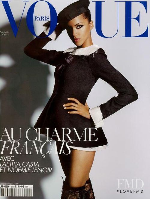 Noemie Lenoir featured on the Vogue France cover from June 2008
