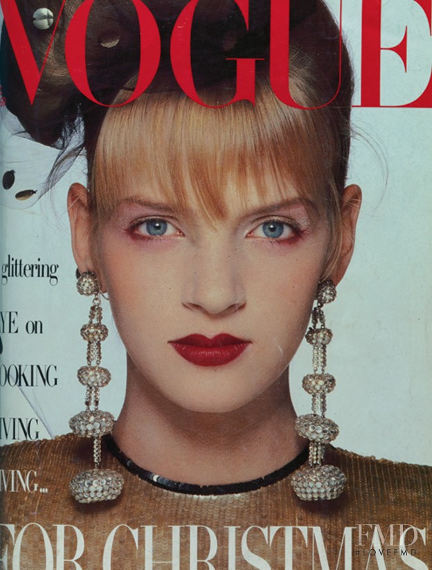 Uma Thurman featured on the Vogue UK cover from December 1985