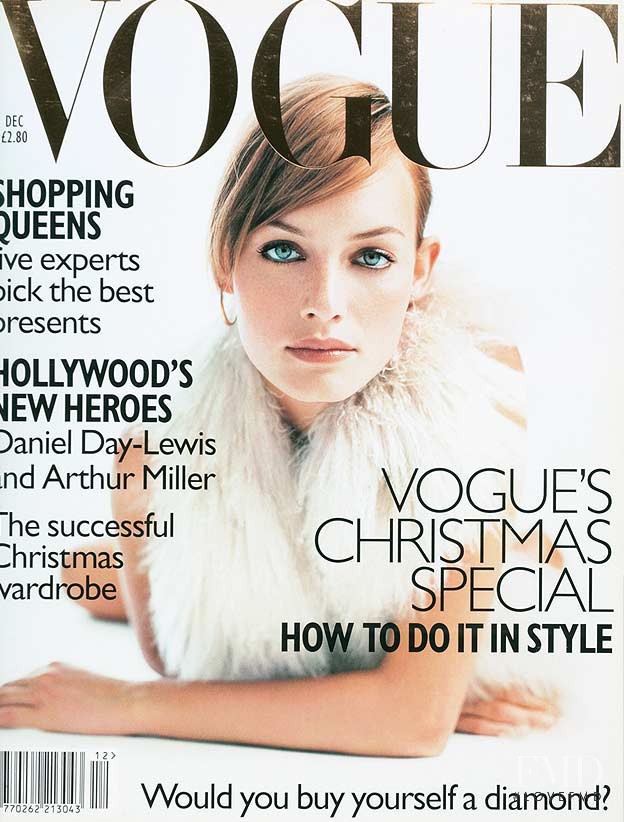 Amber Valletta featured on the Vogue UK cover from December 1996