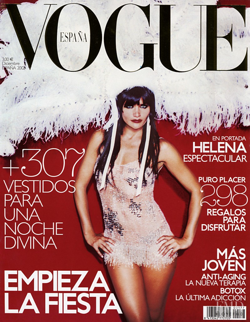 Helena Christensen featured on the Vogue Spain cover from December 2002