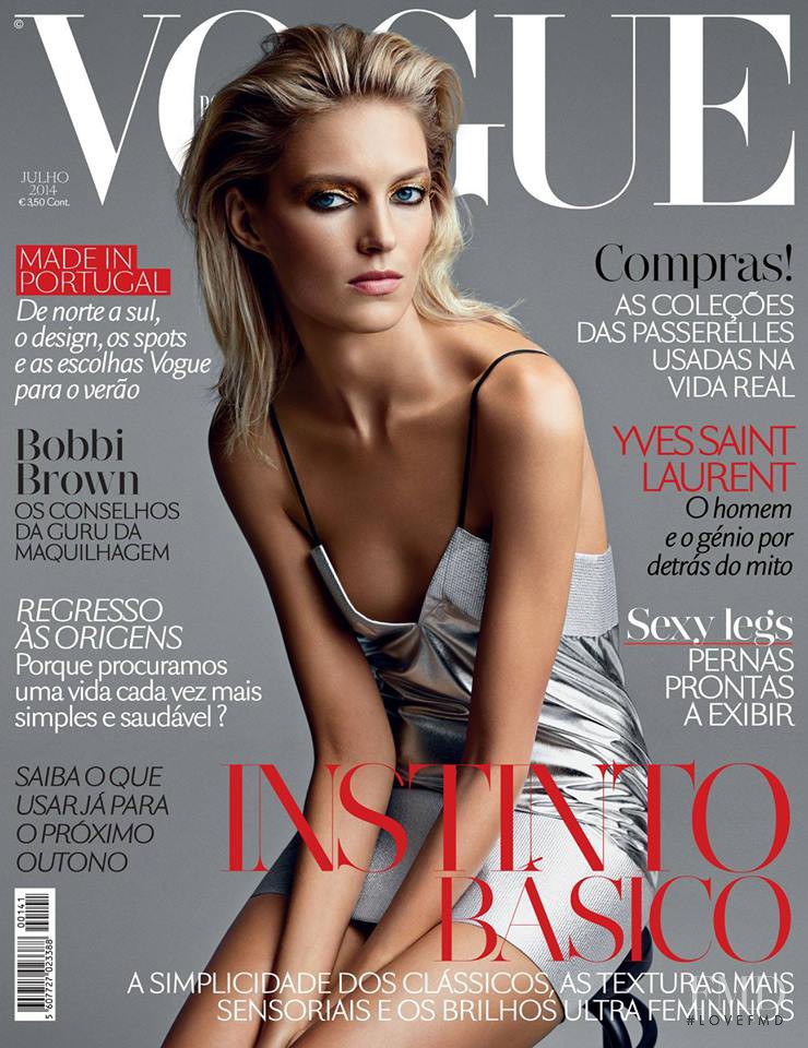 Anja Rubik featured on the Vogue Portugal cover from July 2014