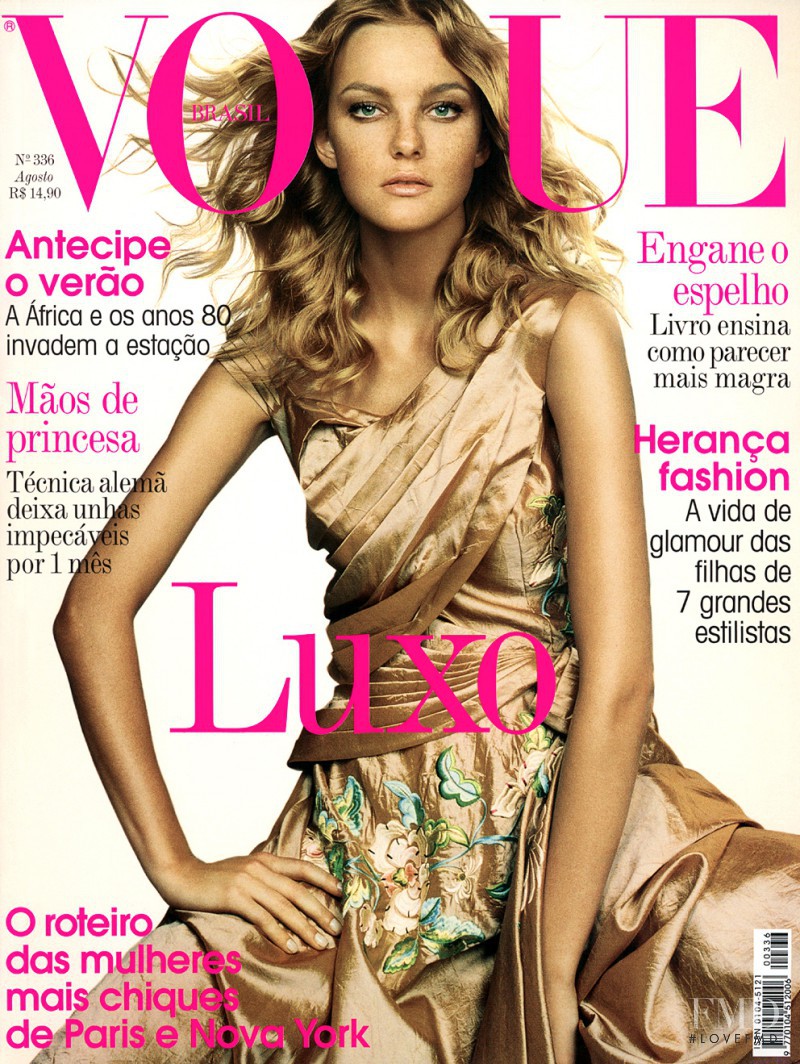 Caroline Trentini featured on the Vogue Brazil cover from August 2006