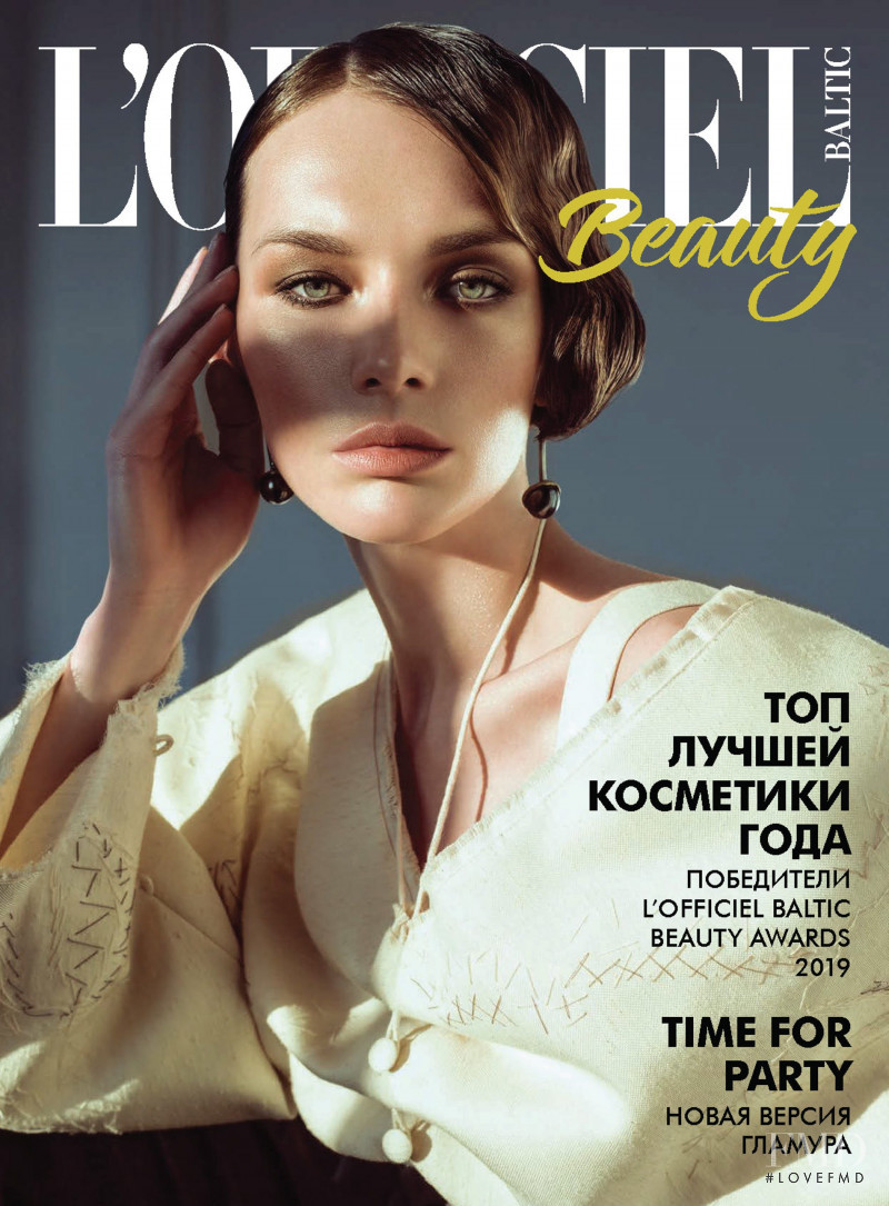 Elisaveta featured on the L\'Officiel Beauty Baltic cover from December 2019