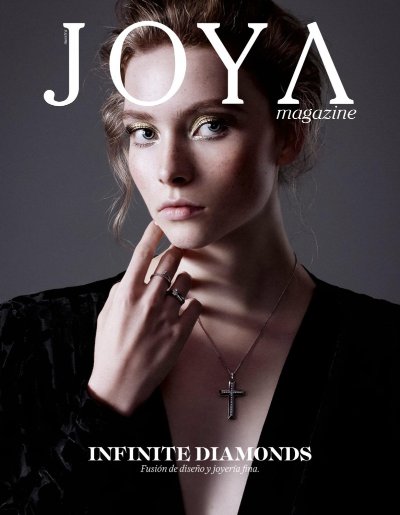 Nina Flores featured on the Joya Magazine cover from October 2019