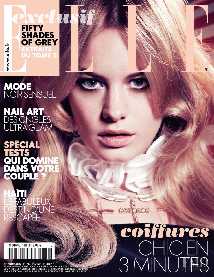 Camille Rowe featured on the Elle France cover from December 2012